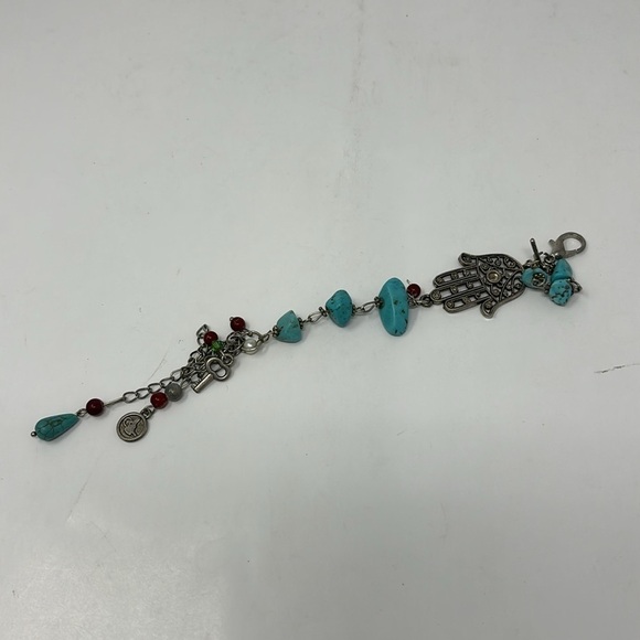 Fatima's hand bracelet with silver-colored turquoise stones and red Stones. - Picture 4 of 6